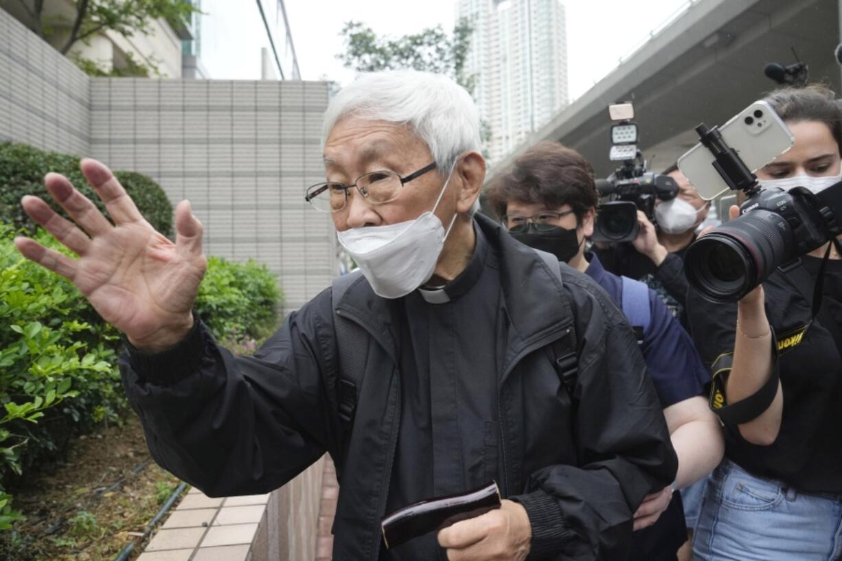 Catholic Cardinal Joseph Zen leaves after an appearance at a court in Hong Kong as he was charged in relation to their past fundraising for activists, Tuesday, May 24, 2022.