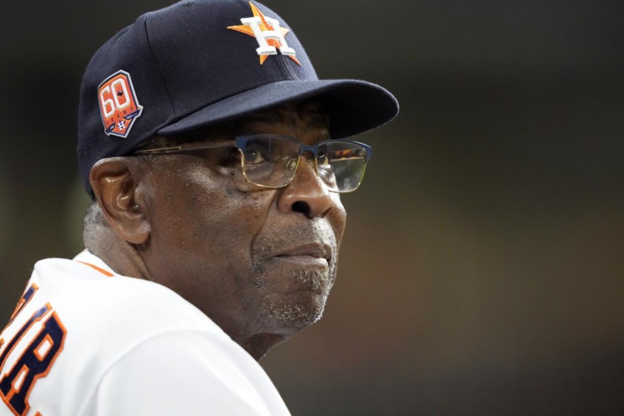 Houston Astros manager Dusty Baker Jr. looks at the scoreboard during the second inning of a baseball game against the Seattle Mariners Tuesday, May 3, 2022, in Houston. (AP Photo/David J. Phillip) (David J.