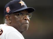 Houston Astros manager Dusty Baker Jr. looks at the scoreboard during the second inning of a baseball game against the Seattle Mariners Tuesday, May 3, 2022, in Houston. (AP Photo/David J. Phillip) (David J.