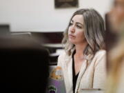 FILE - RaDonda Vaught, a former Vanderbilt University Medical Center nurse charged with in the death of a patient, listens to the opening statements during her trial at Justice A.A. Birch Building in Nashville, Tenn., Tuesday, March 22, 2022.  Nurses planned to protest on Friday, May 13,  morning outside the courtroom where Vaught was scheduled to be sentenced for the death of a patient.  Vaught was found guilty in March of criminally negligent homicide and gross neglect of an impaired adult after she accidentally administered the wrong medication. She faces up to eight years in prison.