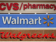 FILE - In this undated combination of photos shown are CVS, Walmart and Walgreens locations. A hearing will begin Tuesday, May 10, 2022, in federal court in Cleveland that will result in a judge determining how much CVSHealth, Walgreens Co. and Walmart Corp. should pay two northeast Ohio counties to help them abate the continuing opioid crisis. A jury in November 2021 concluded that the three pharmacy chains were responsible for damage wrought by the opioid epidemic in Lake and Trumbull counties.