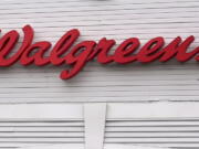 The Walgreens logo on the front of a store, July 14, 2021, in Cambridge, Mass.