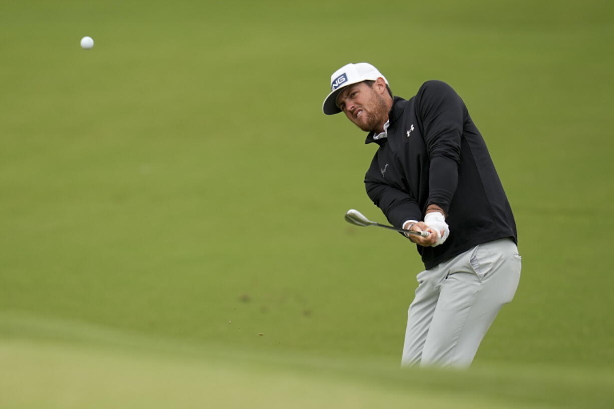 Mito Pereira, of Chile, chips to the green on the fourth hole during the third round of the PGA Championship golf tournament at Southern Hills Country Club, Saturday, May 21, 2022, in Tulsa, Okla.