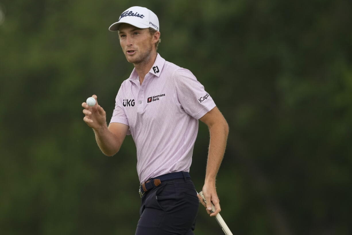 Will Zalatoris waves after making a putt on the eighth hole during the second round of the PGA Championship golf tournament at Southern Hills Country Club, Friday, May 20, 2022, in Tulsa, Okla.