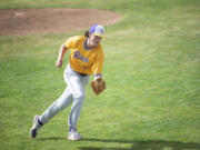 Columbia River's Casey Struckmeier catches a popped bunt attempt that led to a double play during the Rapids' 1-0 loss to Tumwater in the Class 2A state championship baseball team in Yakima on Saturday, May 28, 2022.