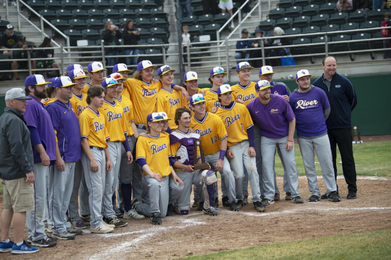 The Columbia River baseball team poses with the second place trophy after the Rapids' 1-0 loss to Tumwater in the Class 2A state championship baseball team in Yakima on Saturday, May 28, 2022.