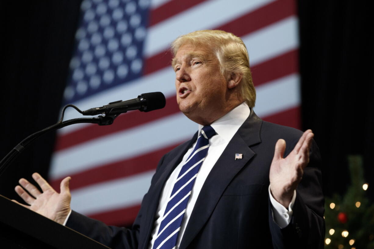 FILE - In this Dec. 13, 2016, photo, President-elect Donald Trump speaks during a rally at the Wisconsin State Fair Exposition Center in West Allis, Wis on Dec. 13, 2016. Two Wisconsin Democratic electors and a voter on Tuesday, May 17, 2021, sued Republicans who attempted to cast electoral ballots for Donald Trump in 2020 despite Joe Biden's victory in the battleground state.