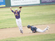 Columbia River's Casey Struckmeier (15) celebrates after making the final out on a force play at second during the Rapids' 1-0 win over Ellensburg in the 2A state baseball semifinal at Yakima County Stadium on Friday, May 27, 2022.