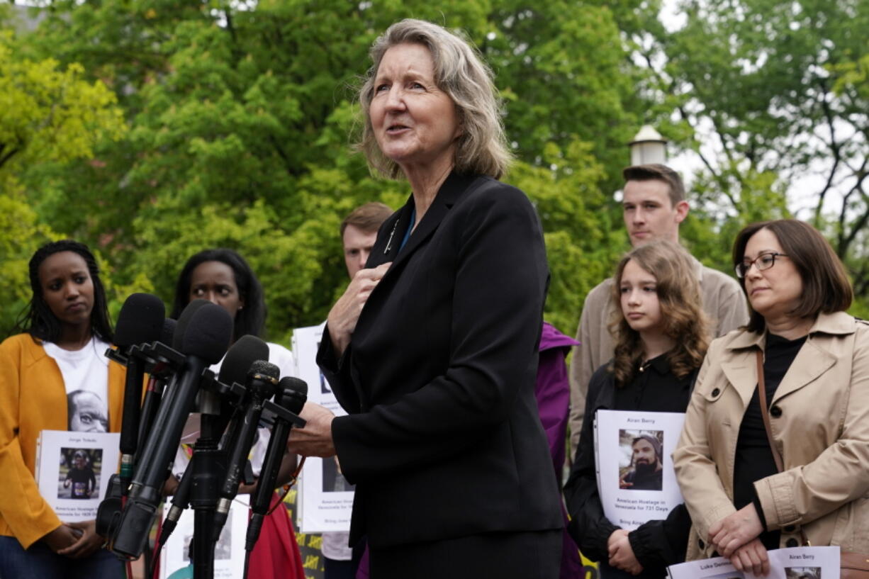 Elizabeth Whelan, sister of U.S. Marine Corps veteran and Russian prisoner Paul Whelan, speaks during a news conference Wednesday in Lafayette Park near the White House alongside families of Americans held hostage or wrongfully detained overseas.