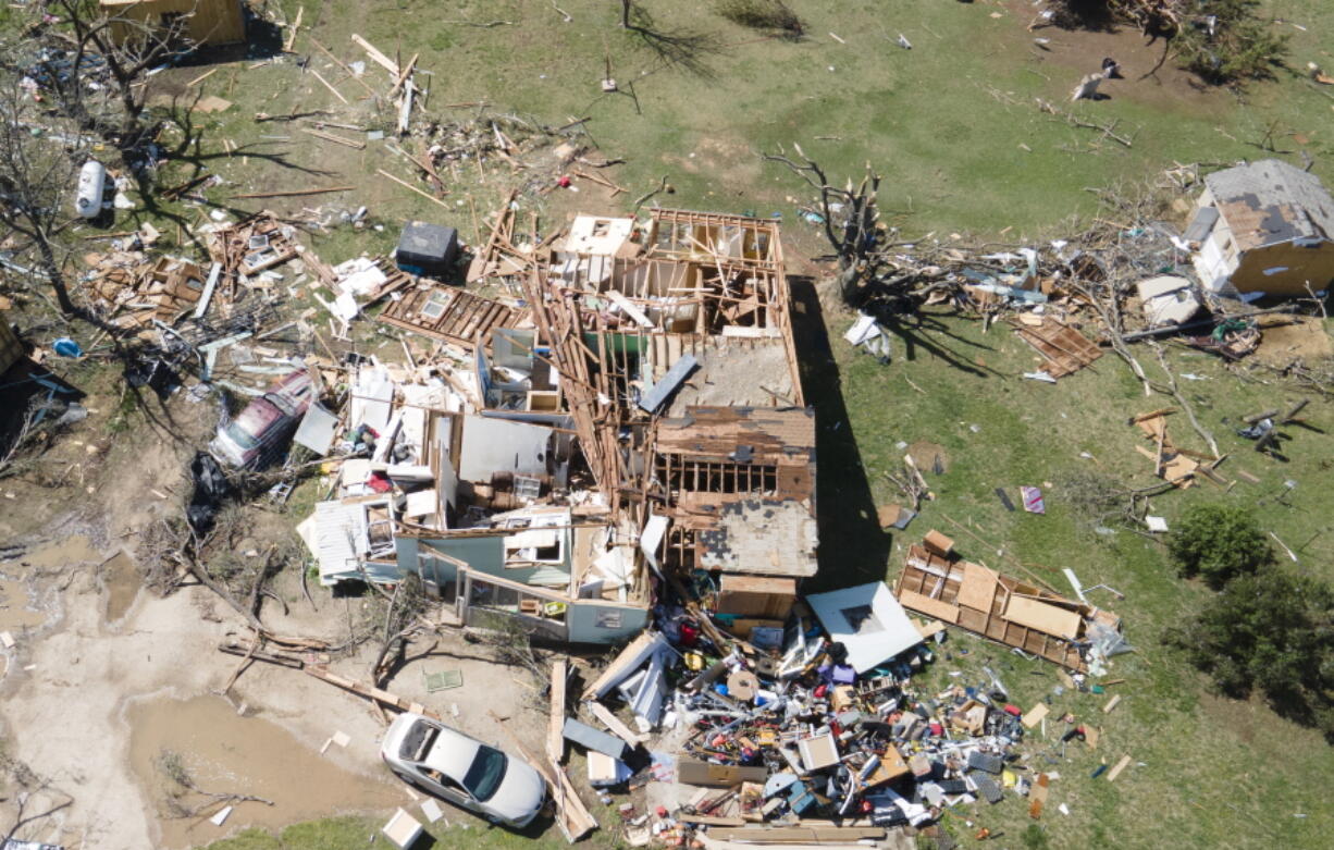 A home is destroyed from a possible tornado the next before near Andover, Kan., on Saturday, April 30, 2022  A suspected tornado that barreled through parts of Kansas has damaged multiple buildings, injured several people and left more than 6,500 people without power.