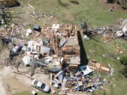 A home is destroyed from a possible tornado the next before near Andover, Kan., on Saturday, April 30, 2022  A suspected tornado that barreled through parts of Kansas has damaged multiple buildings, injured several people and left more than 6,500 people without power.