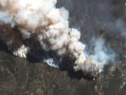 This satellite image provided by Maxar Technologies shows the active fire lines of the Hermits Peak wildfire, in Las Vegas, New Mexico, on Wednesday, May 11, 2022. Wildfire in the West is on a furious pace early this year. Wind-driven flames tearing through vegetation that is extraordinarily dry from years-long drought exacerbated by climate change has made even small blazes a threat to life and property.