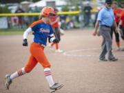 Ridgefield's Mallory Vancleave rounds third after hitting a two-run home run during the Spudders' 10-0 win over West Valley-Spokane in the 2A state softball tournament in Selah on Friday, May 27, 2022.