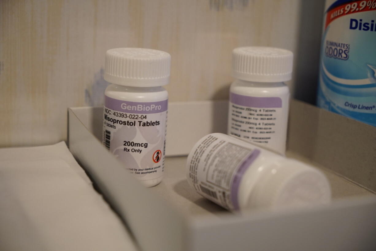 Bottles of the drug misoprostol sit on a table at the West Alabama Women's Center on Tuesday, March 15, 2022 in Tuscaloosa, Ala. The drug is one of two used together in "medication abortions." According to Planned Parenthood, misoprostol, taken after mifepristone, causes cramping and bleeding to empty the uterus. (AP Photo/Allen G.