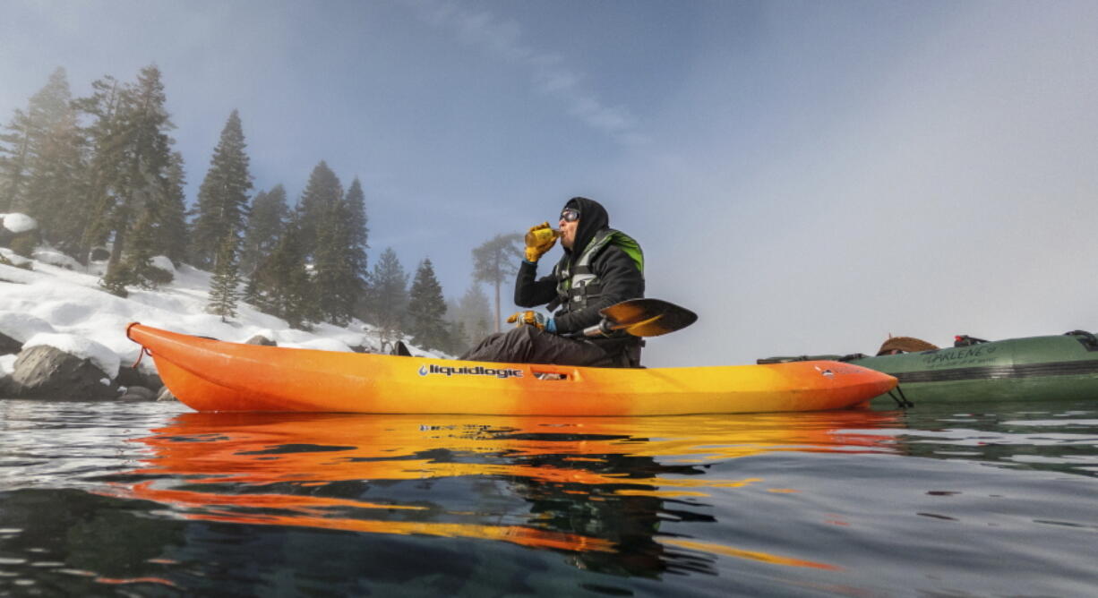 This photo provided by Clean Up The Lake shows Surface Support on the 72 Mile Clean Up during the winter of 2022, in Lake Tahoe, Nev. They found no trace of a mythical sea monster, no sign of mobsters in cement shoes or long-lost treasure chests. But scuba divers who spent the past year cleaning up Lake Tahoe's entire 72-mile (115-kilometer) shoreline have come away with what they hope will prove much more valuable: tons and tons of trash.