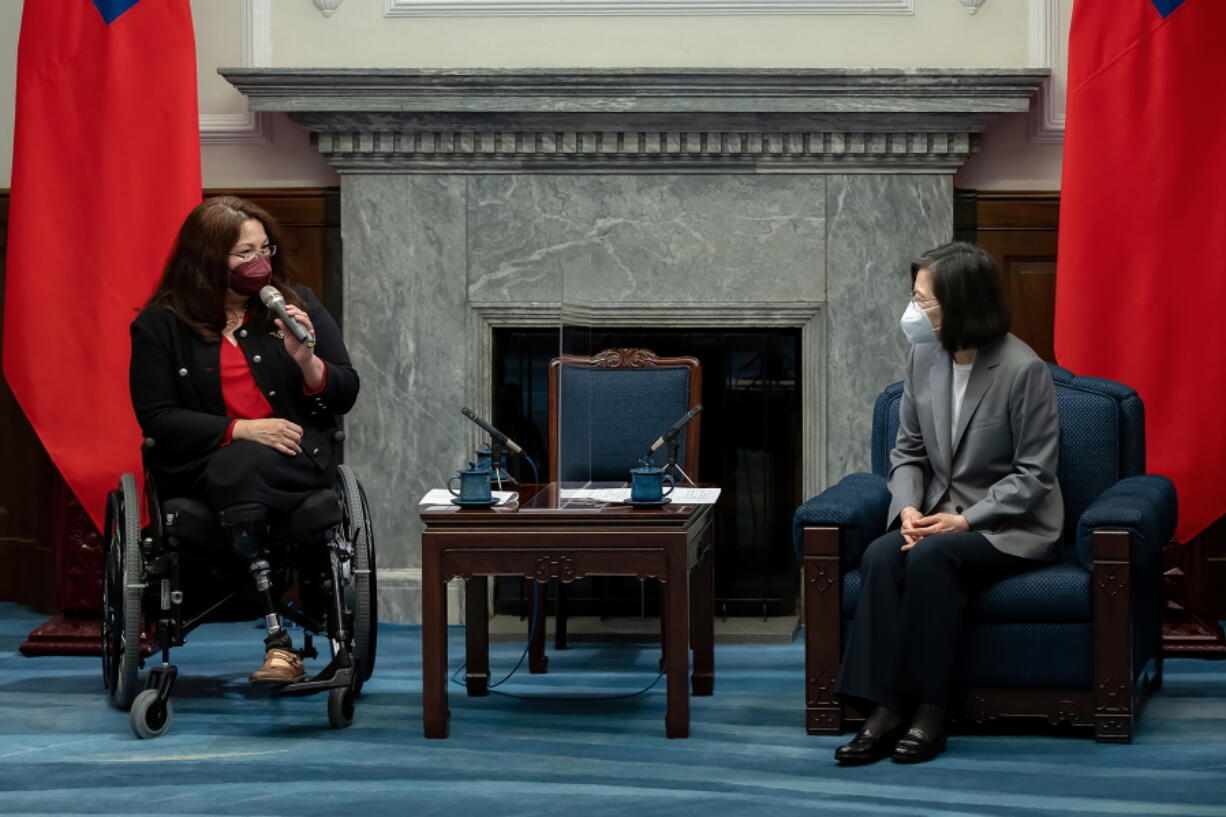 In this photo released by the Taiwan Presidential Office, U.S. Sen. Tammy Duckworth, D-Ill., left, meets with Taiwan's President Tsai Ing-wen at the Presidential Office in Taipei, Taiwan, Tuesday, May 31, 2022. On a visit to Taiwan, reiterated support for the island amid rising Chinese threats.