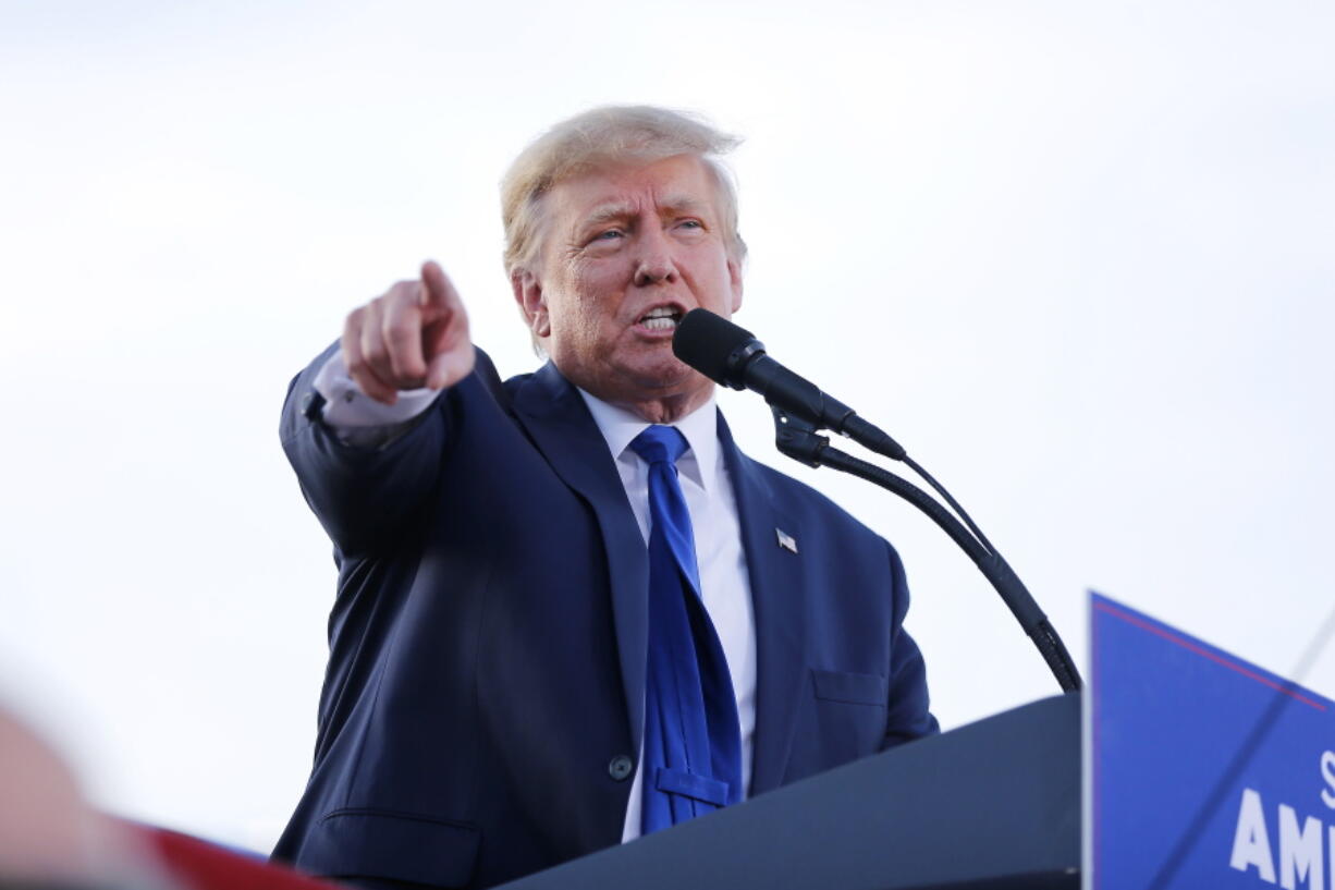 FILE - Former President Donald Trump speaks at a rally at the Delaware County Fairgrounds, Saturday, April 23, 2022, in Delaware, Ohio, to endorse Republican candidates ahead of the Ohio primary. Trump's legal team wants to void a contempt ruling and $10,000-per-day fine against the former president over a subpoena for documents related to a New York civil investigation into his business dealings, saying they've conducted a detailed search for the relevant files.