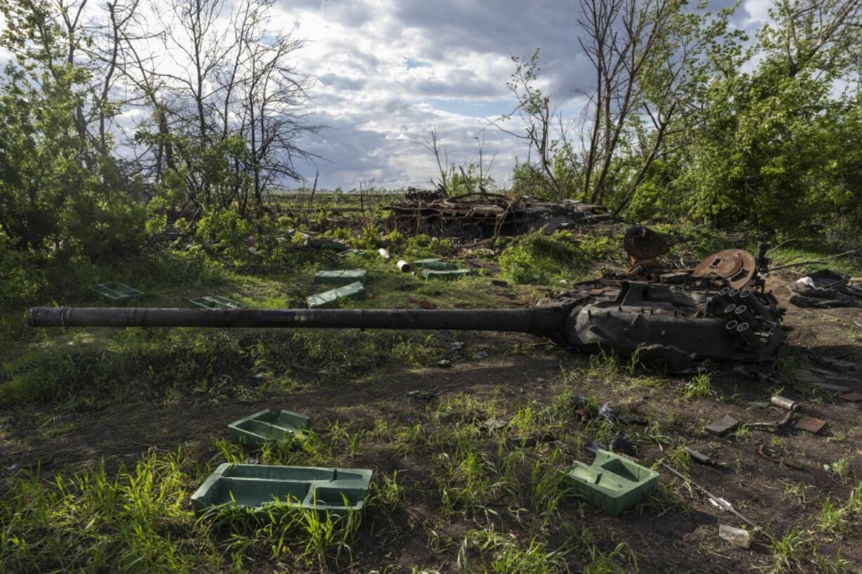 FILE - A destroyed tank near the village of Malaya Rohan, Kharkiv region, Ukraine, Monday, May 16, 2022. Twitter is stepping up its fight against misinformation with a new policy cracking down on posts that spread potentially dangerous false stories. Under the new rules, which take effect Thursday, May 19, 2022, Twitter will no longer automatically recommend posts that mischaracterize conditions during a conflict or make misleading claims about war crimes or atrocities.