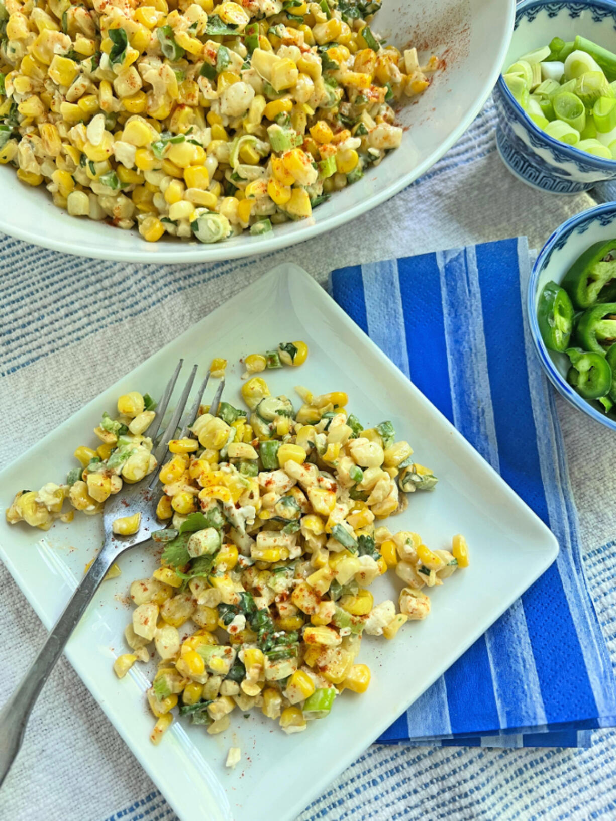 Elote, or Mexican street corn, is made savory with feta, mayonnaise and a sprinkle of smoked paprika.