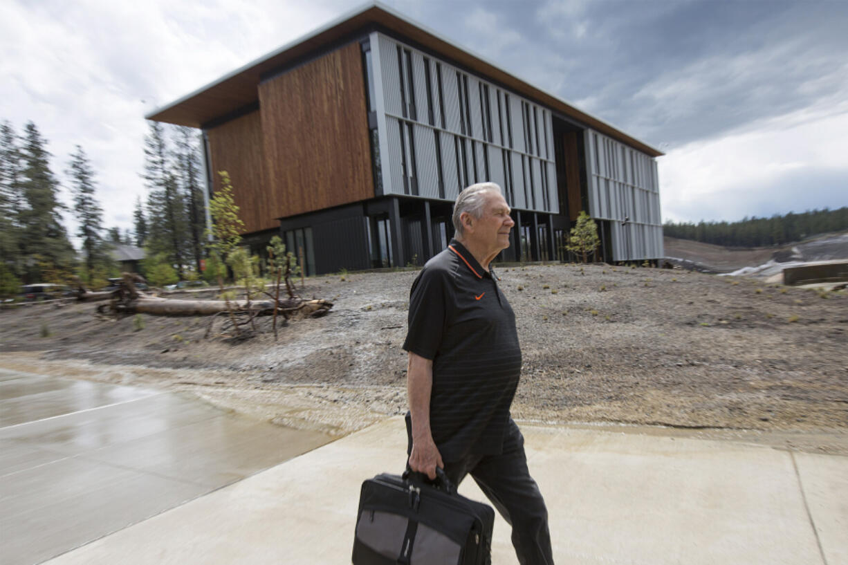 Bob Weed, 85, walks to his vehicle after finishing class on the Oregon State University-Cascades campus in Bend, Ore., on Thursday.