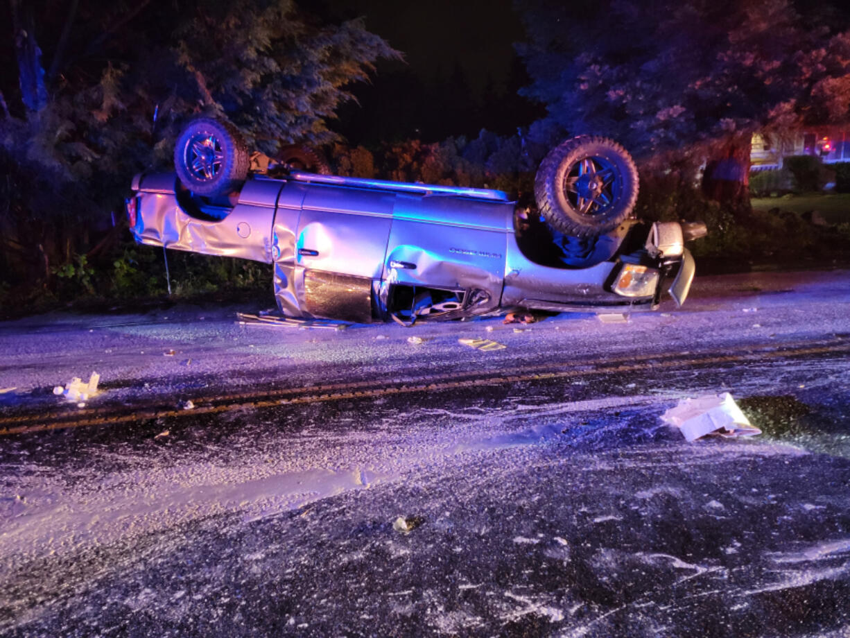 A truck involved in a crash in which one person died Thursday night in Battle Ground. Robert T. McIntyre, 49, was arrested on suspicion of vehicular homicide and vehicular assault.