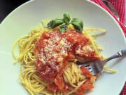 Black pepper linguini gets a easy summer sauce made with fresh tomatoes, onion and garlic.