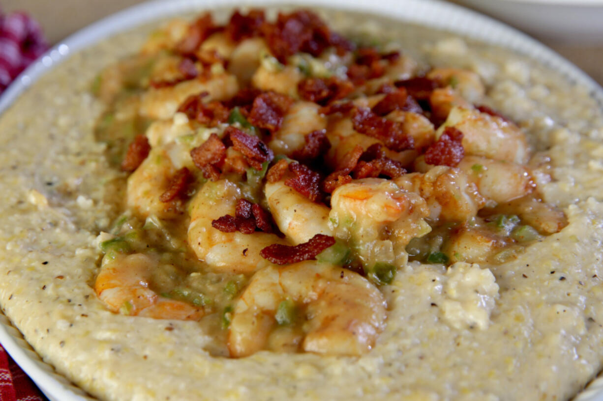 Shrimp and grits, topped with crispy bacon. (Hillary Levin/St.