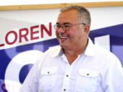 Republican gubernatorial candidate Loren Culp smiles while greeting supporters at a rally Saturday, Aug. 29, 2020, in Mount Vernon, Wash. Culp, police chief of the town of Republic, Wash., and author of the book "American Cop: Upholding the Constitution and Defending Your Right to Bear Arms," will face off against incumbent Democratic Gov. Jay Inslee in November.