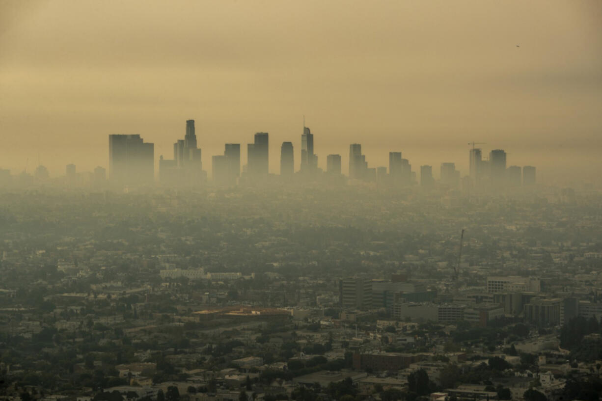 Smoke from Southern California wildfires drifts through the Los Angeles Basin in a view from the Griffith Observatory on Sept. 17, 2020, in Los Angeles.