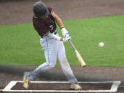 Raptors' Jacob Sharp hits a home run Wednesday, June 1, 2022, during an exhibition game between the Ridgefield Raptors and the Cowlitz Black Bears at the Ridgefield Outdoor Recreation Complex.