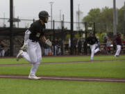 Raptor's Safea Mauai runs to first base during the West Coast League season opener against the  Walla Walla Sweets at Ridgefield Outdoor Recreation Complex on Friday, June 3, 2022.