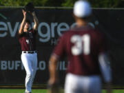 Raptors outfielder Doyle Kane catches a fly ball Tuesday, June 14, 2022, during a Raptors game against the Edmonton Riverhawks at the Ridgefield Outdoor Recreation Complex.