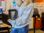 Woodland High School's Taylor Curnutt received the Silent Servant Student Award from the Peter R. Marsh Foundation which includes a special plaque along with a $500 grant for use toward Taylor's future plans.