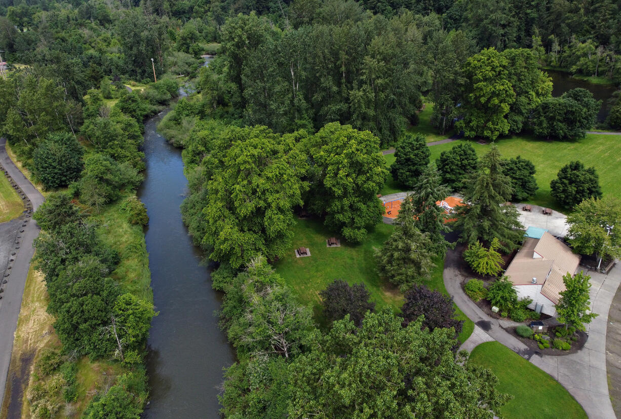 A swollen Salmon Creek flows through the Klineline Pond area as the Columbia River and surrounding areas continue to run high, as seen on Tuesday morning, June 14, 2022.