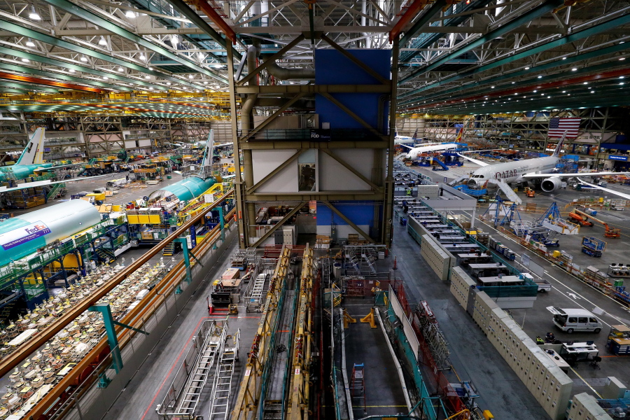 The 777 factory line, left, is seen next to the 787 line, right, at Boeing's Everett Production Facility Wednesday, June 15, 2022, in Everett, Wash.