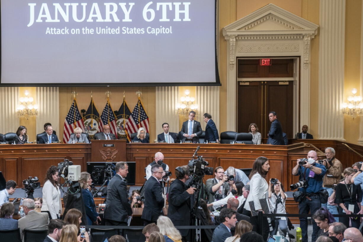 Cassidy Hutchinson, former aide to Trump White House chief of staff Mark Meadows, exits the hearing room as the House select committee investigating the Jan. 6 attack on the U.S. Capitol holds a hearing at the Capitol in Washington, Tuesday, June 28, 2022.