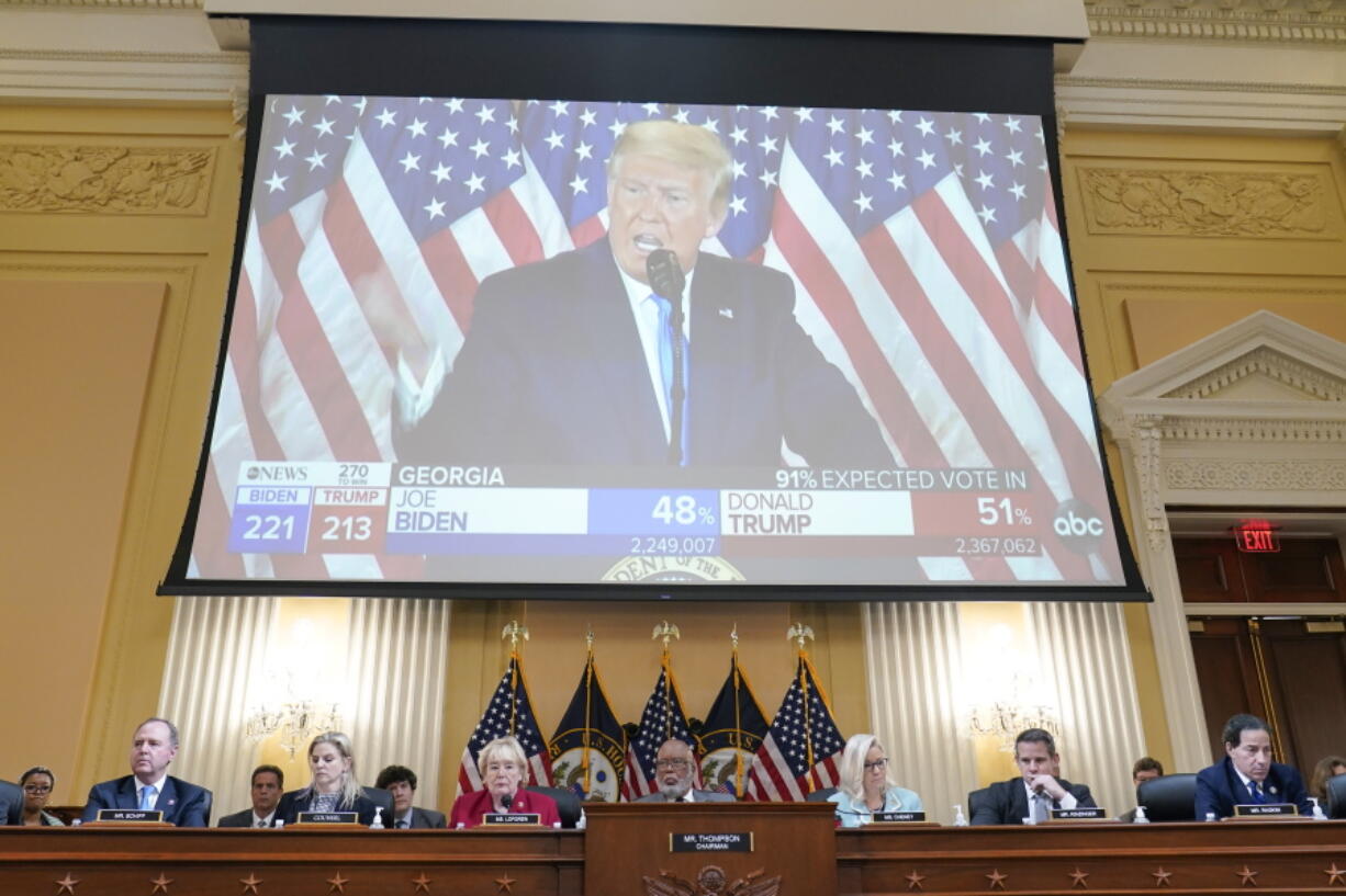 A video exhibit plays as the House select committee investigating the Jan. 6 attack on the U.S. Capitol continues to reveal its findings of a year-long investigation, at the Capitol in Washington, Monday, June 13, 2022. The 1/6 committee is set to plunge into Donald Trump's last-ditch effort to salvage the 2020 election by pressuring Vice President Mike Pence to reject the electoral count -- a highly unusual and potentially illegal strategy that was set in motion in the run-up to the Capitol riot.