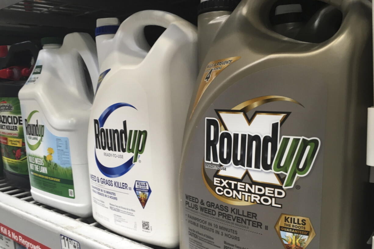 FILE - Containers of Roundup are displayed on a store shelf in San Francisco, on Feb. 24, 2019. A federal appeals court has rejected a Trump administration finding that glyphosate, the active ingredient in the weed killer Roundup, does not pose a serious health risk and is "not likely" to cause cancer in humans.