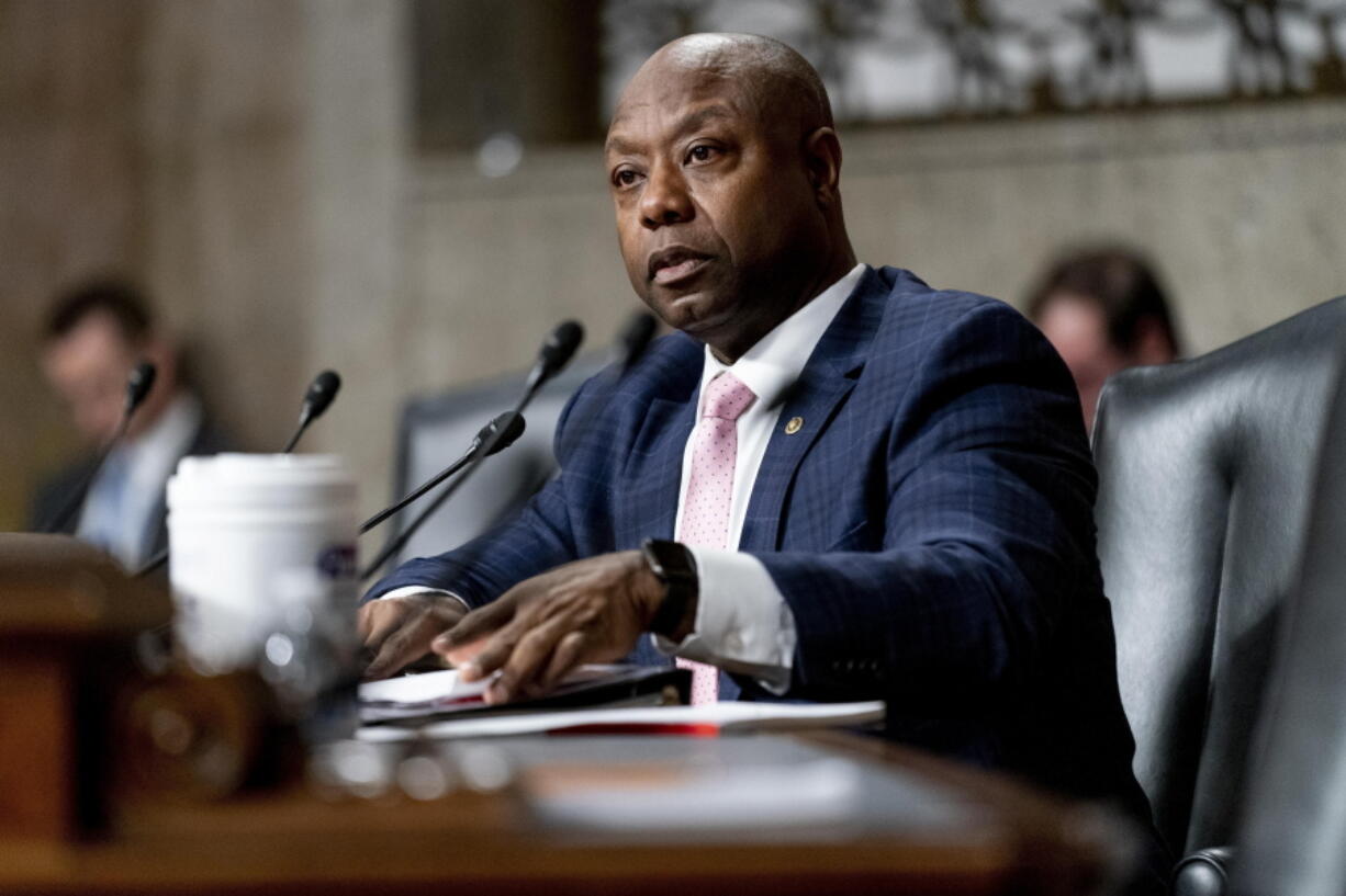 FILE - Sen. Tim Scott, R-S.C., speaks during a Senate Banking Committee hearing on Capitol Hill in Washington, Nov. 30, 2021.  Three women are competing for the Democratic nomination to take on Sen. Tim Scott, who said this will be his last term if he is reelected. Scott has no Republican opposition and has raised $44 million for his pursuit of a second full six-year term.