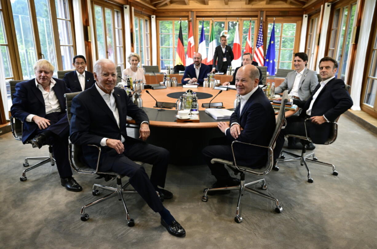 Clockwise from left, British Prime Minister Boris Johnson,  Japanese Prime Minister Fumio Kishida, the President of the European Commission Ursula von der Leyen, European Council President Charles Michel, Italian Prime Minister Mario Draghi, Canadian Prime Minister Justin Trudeau, French President Emmanuel Macron, German Chancellor Olaf Scholz and U.S. President Joe Biden attend a working session during of the G7 leaders summit at Castle Elmau in Kruen, near Garmisch-Partenkirchen, Germany, on Tuesday, June 28, 2022. The Group of Seven leading economic powers are meeting in Germany for their annual gathering Sunday through Tuesday.