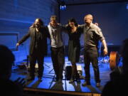 Wassim Mukdag, Borys Slowikowski, Eden Cami and Or Rozenfeld of Arab-Israeli-Jewish band Kayan Project acknowledge the applause of the audience during a concert at the Jewish theatre boat 'MS Goldberg' in Berlin, Sunday, May 29, 2022. The Berlin band Kayan Project, with a diverse cast of musicians from across the Middle East, might never been able to perform together in the members' home countries. But it has risen to local fame in Berlin, Germany, with its unique style that combines oriental tunes with both Arabic and Hebrew lyrics. The band members include an Arab-Druze singer from northern Israel, a Syrian refugee and a Jewish Israeli bassist.