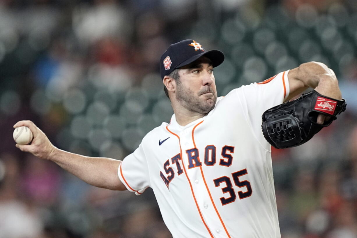 Houston Astros starting pitcher Justin Verlander throws against the Seattle Mariners during the first inning of a baseball game Tuesday, June 7, 2022, in Houston. (AP Photo/David J.