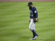 Seattle Mariners relief pitcher Sergio Romo walks back to the dugout after he was pulled during the sixth inning of the team's baseball game against the Baltimore Orioles, Wednesday, June 1, 2022, in Baltimore.