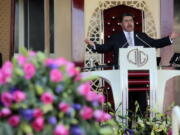 FILE - Naas?n Joaqu?n Garc?a leads a service at his church "La Luz del Mundo" in Guadalajara, Mexico on Aug. 9, 2018. Garc?a, the leader of the Mexican megachurch La Luz del Mundo, pleaded guilty Friday, June 3, 2022, to sexually abusing three girls, California state prosecutors said.