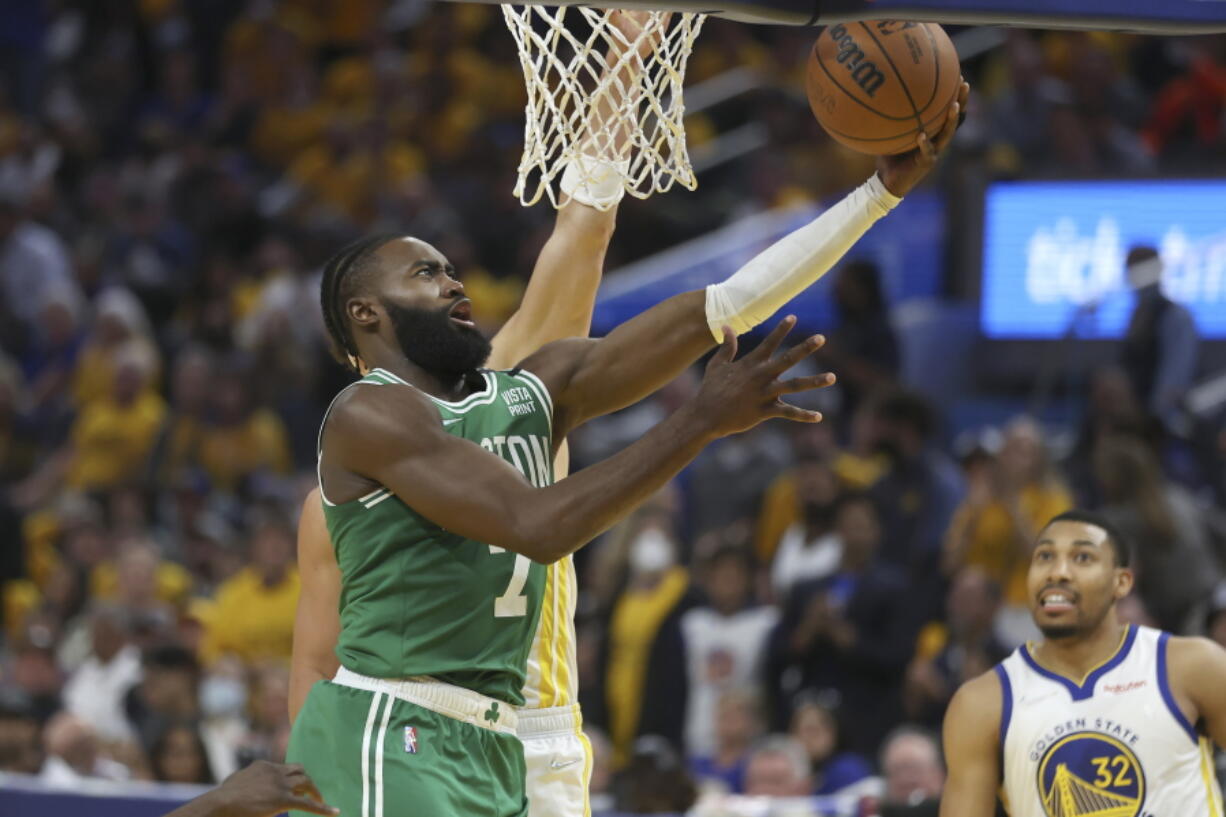 Boston Celtics guard Jaylen Brown (7) shoots against the Golden State Warriors during the second half of Game 1 of basketball's NBA Finals in San Francisco, Thursday, June 2, 2022.