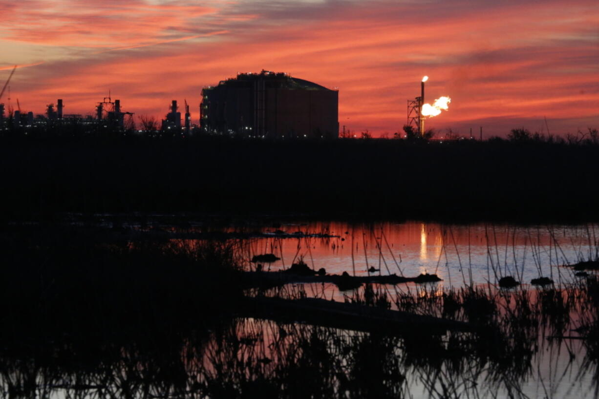 A flare burns at Venture Global LNG in Cameron, La., on Friday, April 21, 2022. The new facility, which exports liquefied natural gas, is one of several like it along the Gulf Coast -- and there are proposals for several more in Louisiana and Texas. Natural gas from the Permian Basin in Texas and other areas is sent by pipeline to the export facilities. It is then cooled and liquefied, making it possible to send much greater quantities by ship to Asia, Europe and other places that are hungry for natural gas.