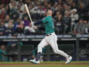 Seattle Mariners' Adam Frazier looks up as he pops out with the bases loaded to end the fifth inning of the team's baseball game against the Boston Red Sox, Friday, June 10, 2022, in Seattle. (AP Photo/Ted S.