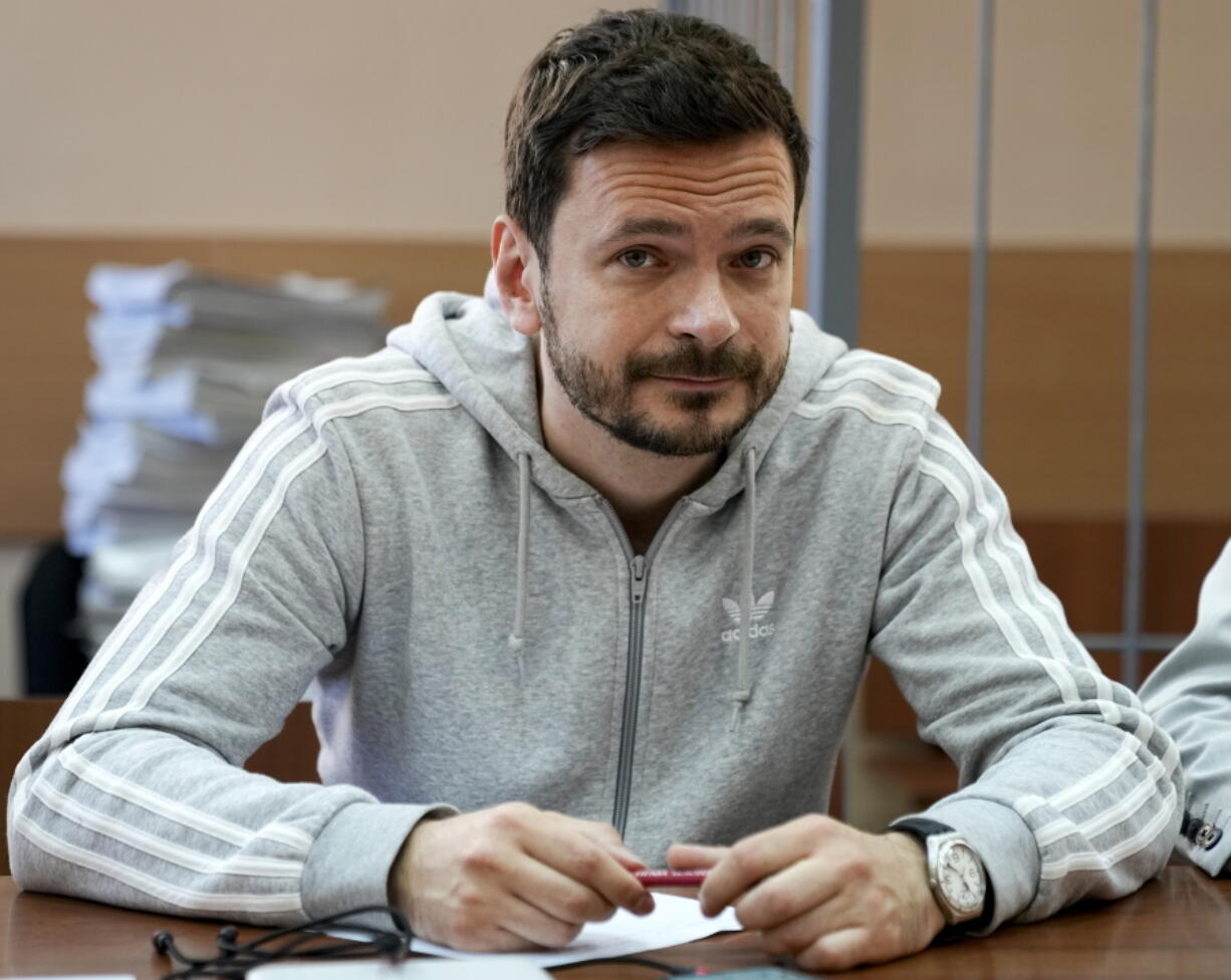 Ilya Yashin, Russian opposition activist and a municipal deputy of the Krasnoselsky district of Moscow, attends a court session in Moscow, Russia, Tuesday, June 28, 2022. On Tuesday, prominent opposition politician Ilya Yashin was sentenced to 15 days in jail on charges of failing to obey police. He was detained late Monday while walking in a park and police said he had grabbed one by the uniform and vulgarly insulted them.