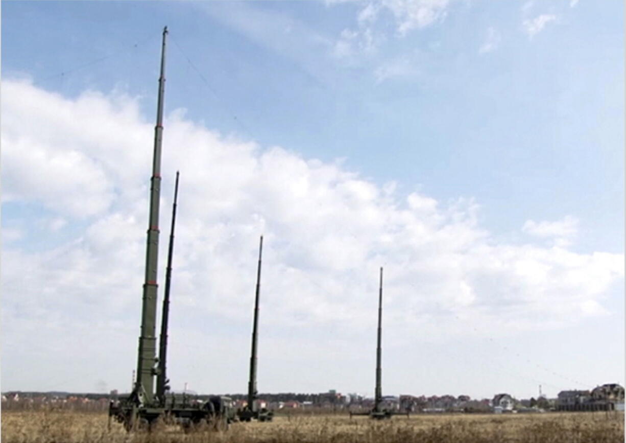 In this handout photo provided by Russian Defense Ministry Press Service on Sept. 19, 2021, The Palantin-K EW systems are parked during a rehearsal in Voronezh region, Russia.