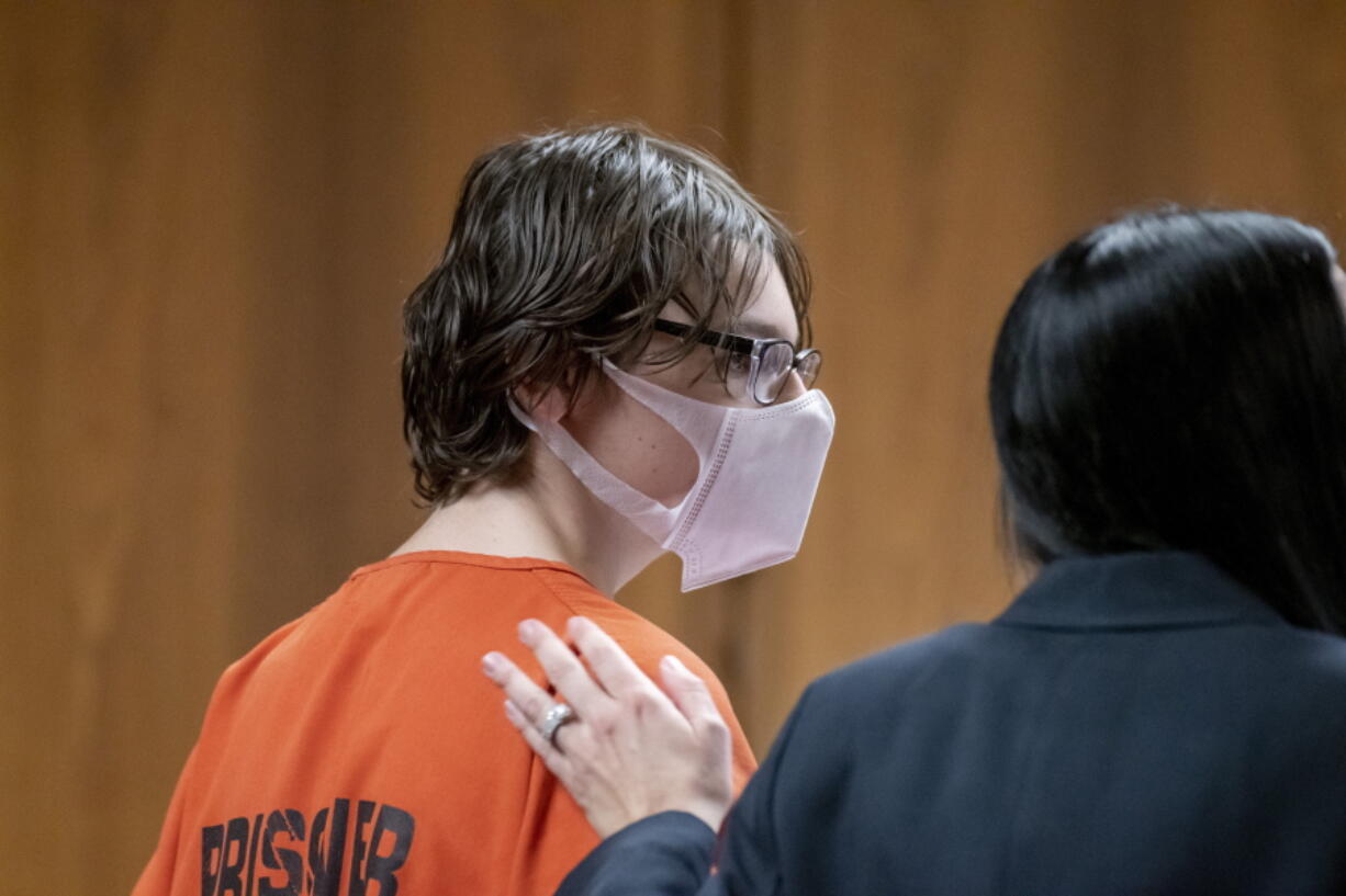 Ethan Crumbley attends a hearing at Oakland County circuit court in Pontiac, Mich., on Feb. 22, 2022. A judge on Thursday, June 23, 2022 postponed a murder trial until January in the case of the teenager accused of killing four fellow students and injuring others at a Michigan high school. Lawyers for Crumbley said a September trial date wouldn't leave enough time to go through evidence and prepare.